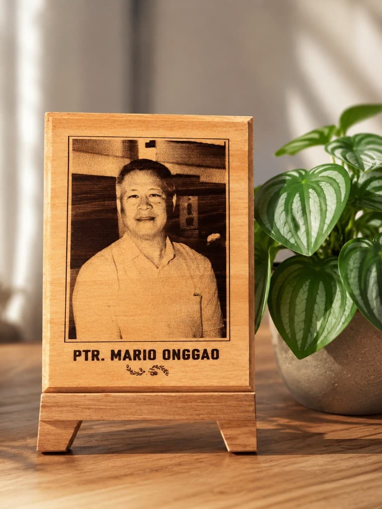 Commemorative wooden plaque with engraved portrait and dedication